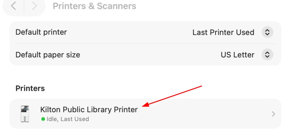 Screenshot of the Printers & Scanners dialog showing the newly added printer under the Printers section.